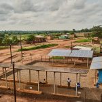 Solar panels providing electricity through a community mini-grid